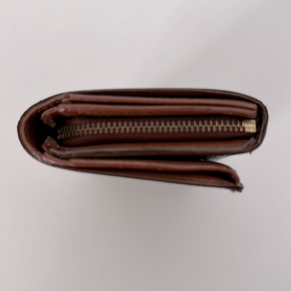 Authenticated LOUIS VUITTON Monogram Tressor Wallet - Picture 6 of 14